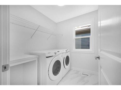 788 Creekstone Circle Sw, Calgary, AB - Indoor Photo Showing Laundry Room