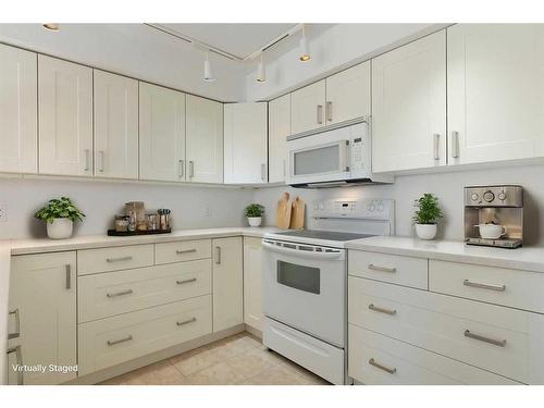 3153-1818 Simcoe Boulevard Sw, Calgary, AB - Indoor Photo Showing Kitchen