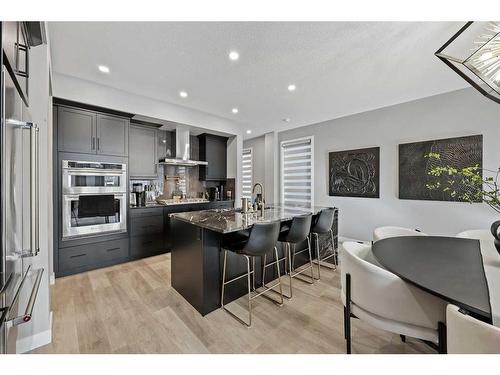 145 Edith Villas Nw, Calgary, AB - Indoor Photo Showing Kitchen With Upgraded Kitchen