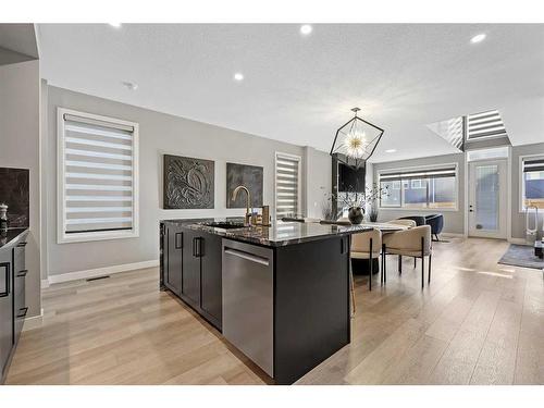 145 Edith Villas Nw, Calgary, AB - Indoor Photo Showing Kitchen With Upgraded Kitchen