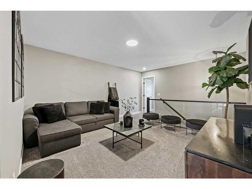 145 Edith Villas Nw, Calgary, AB - Indoor Photo Showing Living Room