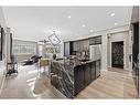 145 Edith Villas Nw, Calgary, AB  - Indoor Photo Showing Kitchen With Upgraded Kitchen 