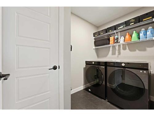 145 Edith Villas Nw, Calgary, AB - Indoor Photo Showing Laundry Room