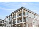 4413-111 Wolf Creek Drive Se, Calgary, AB  - Outdoor With Balcony 