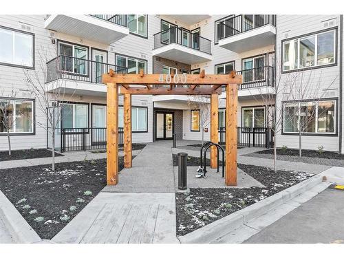 4413-111 Wolf Creek Drive Se, Calgary, AB - Outdoor With Balcony With Facade