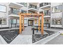 4413-111 Wolf Creek Drive Se, Calgary, AB  - Outdoor With Balcony With Facade 