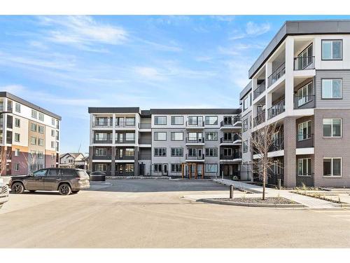 4413-111 Wolf Creek Drive Se, Calgary, AB - Outdoor With Balcony With Facade