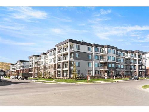 4413-111 Wolf Creek Drive Se, Calgary, AB - Outdoor With Balcony With Facade