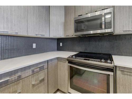 105-214 Sherwood Square Nw, Calgary, AB - Indoor Photo Showing Kitchen