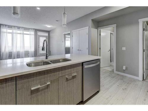 105-214 Sherwood Square Nw, Calgary, AB - Indoor Photo Showing Kitchen With Double Sink