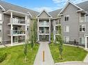 2202 Tuscarora Manor Nw, Calgary, AB  - Outdoor With Balcony With Facade 