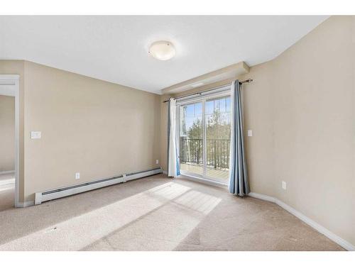 1207-130 Panatella Street Nw, Calgary, AB - Indoor Photo Showing Other Room