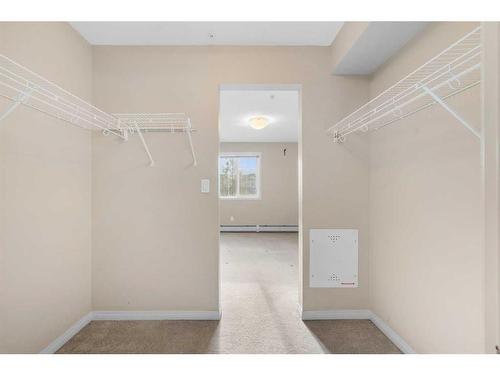 1207-130 Panatella Street Nw, Calgary, AB - Indoor With Storage