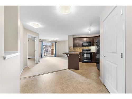 1207-130 Panatella Street Nw, Calgary, AB - Indoor Photo Showing Kitchen