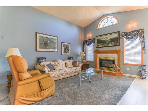 116 Hamptons Park Nw, Calgary, AB - Indoor Photo Showing Living Room With Fireplace