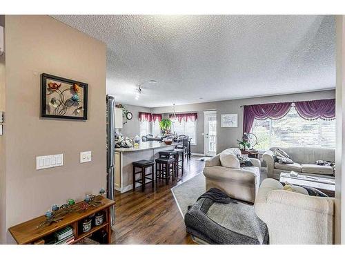 242 Coville Circle Ne, Calgary, AB - Indoor Photo Showing Living Room