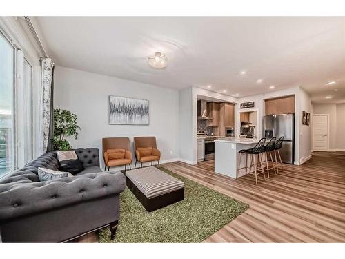 318 Chelsea Hollow, Chestermere, AB - Indoor Photo Showing Living Room