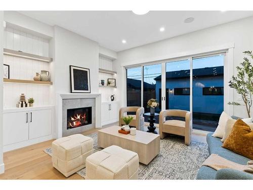 2628 4 Avenue Nw, Calgary, AB - Indoor Photo Showing Living Room With Fireplace