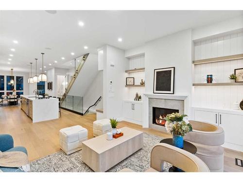 2628 4 Avenue Nw, Calgary, AB - Indoor Photo Showing Living Room With Fireplace