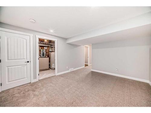 1180 Kings Heights Road Se, Airdrie, AB - Indoor Photo Showing Other Room