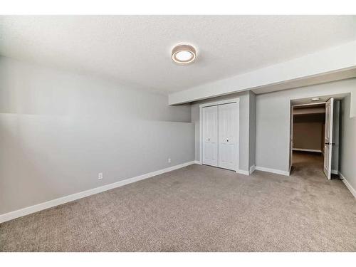 1180 Kings Heights Road Se, Airdrie, AB - Indoor Photo Showing Other Room