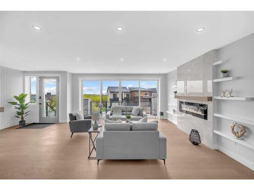 49 Rockhaven Green Nw, Calgary, AB - Indoor Photo Showing Living Room With Fireplace