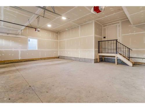 230 Kinniburgh Loop, Chestermere, AB - Indoor Photo Showing Garage