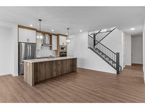 230 Kinniburgh Loop, Chestermere, AB - Indoor Photo Showing Kitchen With Upgraded Kitchen