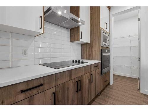 230 Kinniburgh Loop, Chestermere, AB - Indoor Photo Showing Kitchen