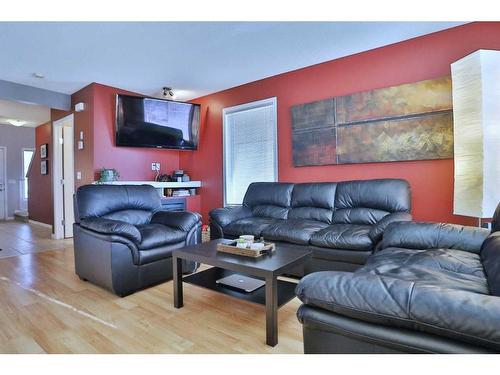 144 Hidden Creek Rise Nw, Calgary, AB - Indoor Photo Showing Living Room