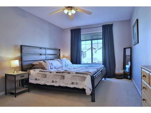 144 Hidden Creek Rise Nw, Calgary, AB - Indoor Photo Showing Bedroom