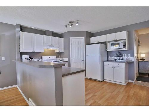 144 Hidden Creek Rise Nw, Calgary, AB - Indoor Photo Showing Kitchen