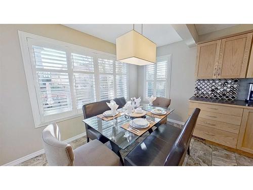 9 Prairie Springs Close Sw, Airdrie, AB - Indoor Photo Showing Dining Room