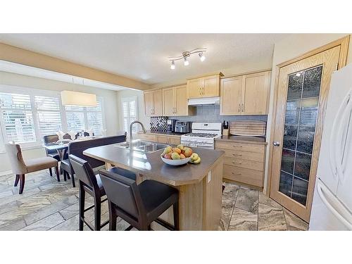 9 Prairie Springs Close Sw, Airdrie, AB - Indoor Photo Showing Kitchen