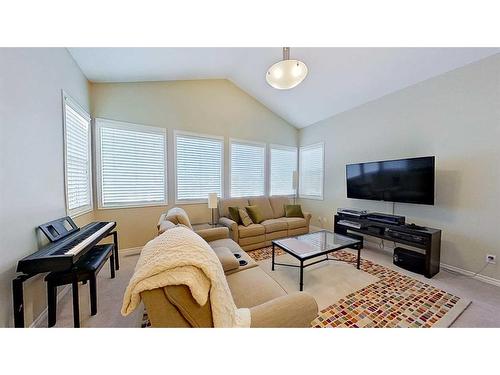 9 Prairie Springs Close Sw, Airdrie, AB - Indoor Photo Showing Living Room