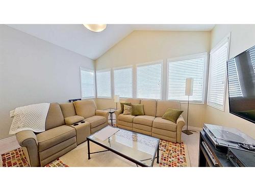 9 Prairie Springs Close Sw, Airdrie, AB - Indoor Photo Showing Living Room