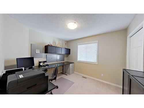 9 Prairie Springs Close Sw, Airdrie, AB - Indoor Photo Showing Office