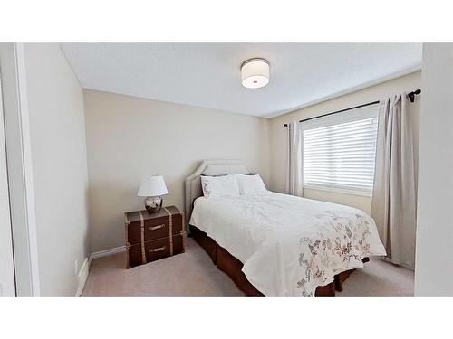 9 Prairie Springs Close Sw, Airdrie, AB - Indoor Photo Showing Bedroom