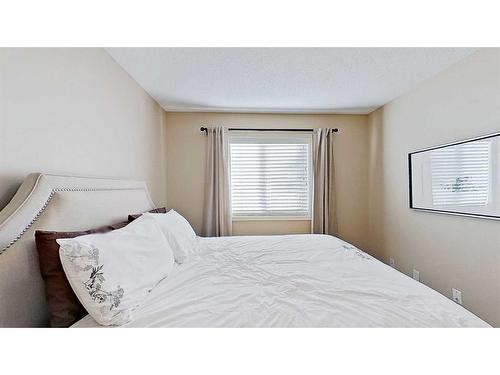 9 Prairie Springs Close Sw, Airdrie, AB - Indoor Photo Showing Bedroom