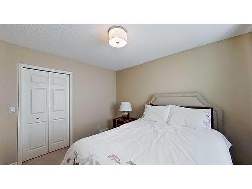 9 Prairie Springs Close Sw, Airdrie, AB - Indoor Photo Showing Bedroom