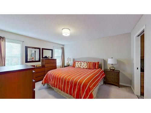 9 Prairie Springs Close Sw, Airdrie, AB - Indoor Photo Showing Bedroom