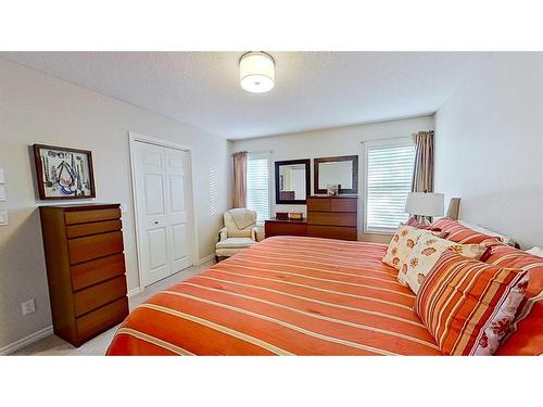 9 Prairie Springs Close Sw, Airdrie, AB - Indoor Photo Showing Bedroom