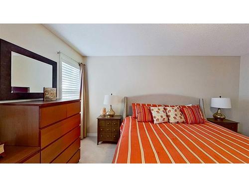 9 Prairie Springs Close Sw, Airdrie, AB - Indoor Photo Showing Bedroom