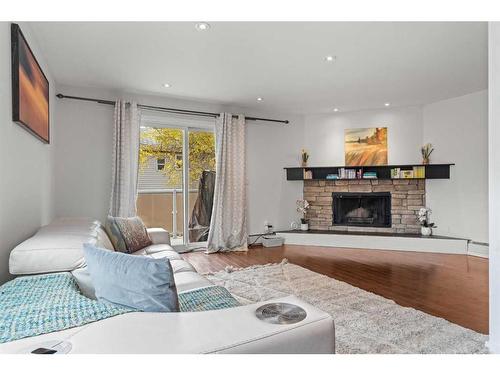 A-2115 35 Avenue Sw, Calgary, AB - Indoor Photo Showing Living Room With Fireplace