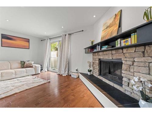 A-2115 35 Avenue Sw, Calgary, AB - Indoor Photo Showing Living Room With Fireplace