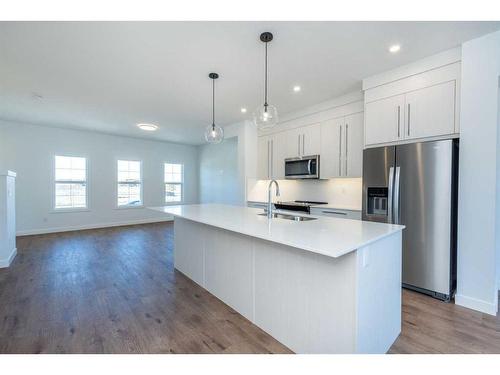 54 Dawson Drive, Chestermere, AB - Indoor Photo Showing Kitchen With Stainless Steel Kitchen With Upgraded Kitchen