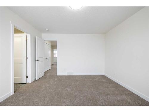 509 Clearwater Heath, Chestermere, AB - Indoor Photo Showing Other Room