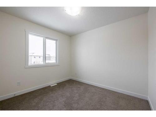 509 Clearwater Heath, Chestermere, AB - Indoor Photo Showing Other Room