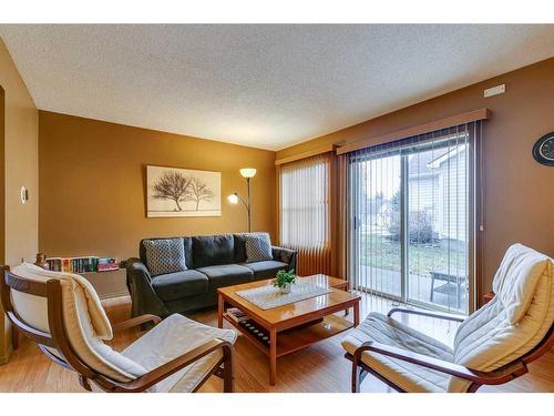 151 Somervale Park Sw, Calgary, AB - Indoor Photo Showing Living Room