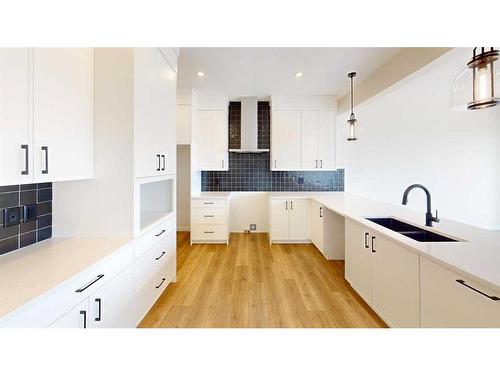 54 Savoy Landing Se, Calgary, AB - Indoor Photo Showing Kitchen With Double Sink With Upgraded Kitchen